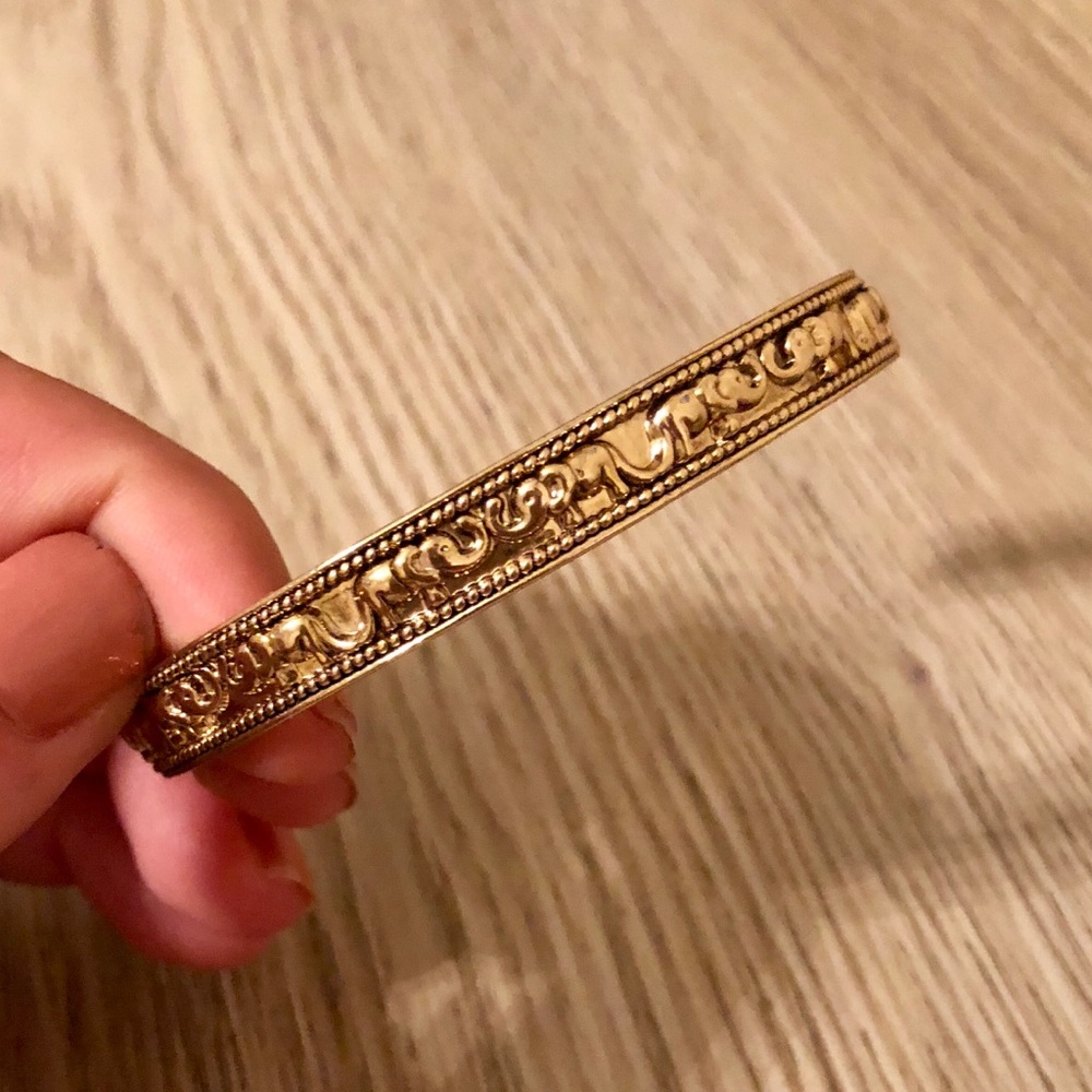 Gold elephant bangle
